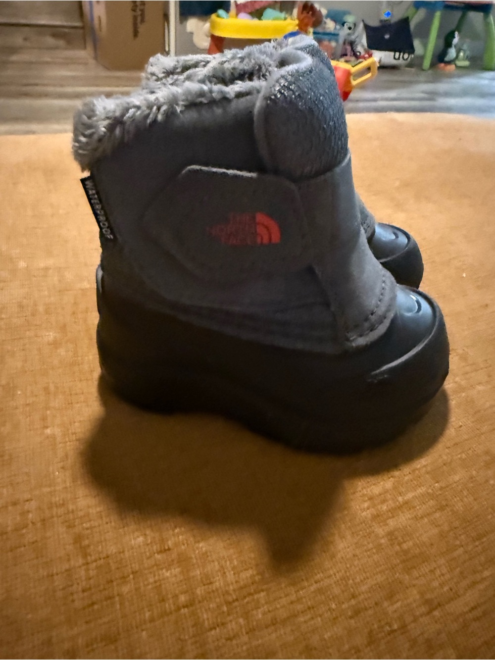 The North Face Kids Gray and Black Insulated Snow Boots with Pink Logo